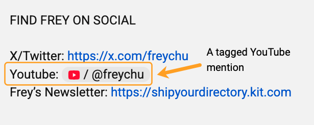 Example of tagged YouTube mention showing '@freychu' channel handle with red YouTube icon and arrow pointing to text 'A tagged YouTube mention'